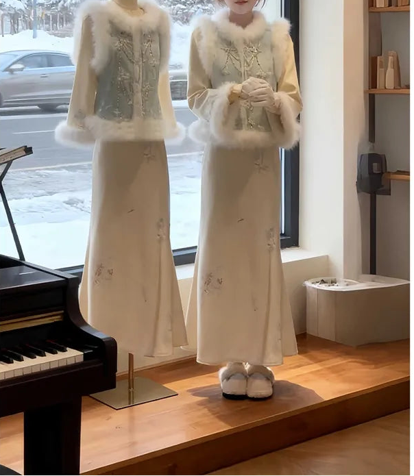 A two-piece set featuring Chinese-style vest and cheongsam skirt.